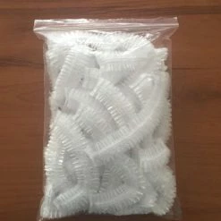 Hete verkoop 😉 LOUZIR Handige Wegwerp Douche Muts Transparant -20 Stuks 👍 -La Roche Shop 550x556 8