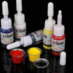 Coupon 😉 Stigma Complete Tattoo Set Met Tatoeage Gun Liner Shader 5x Inkt En 20 Tattoo Naalden, Oefenhuid ⭐ -La Roche Shop 550x600 1